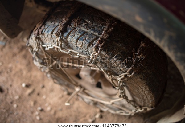 wheel cover with chain for slip slide off road\
on the mountain