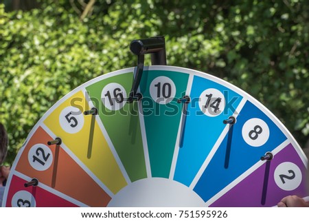 The wheel of fortune hung up at a festival. Animation for young and old.	