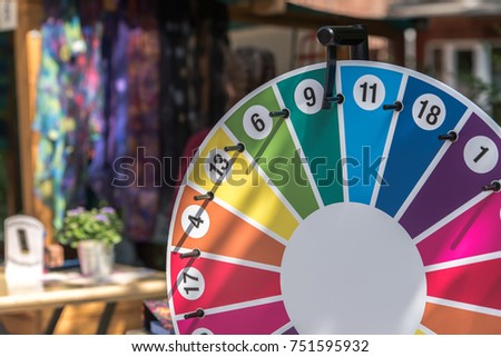 The wheel of fortune hung up at a festival. Animation for young and old.	