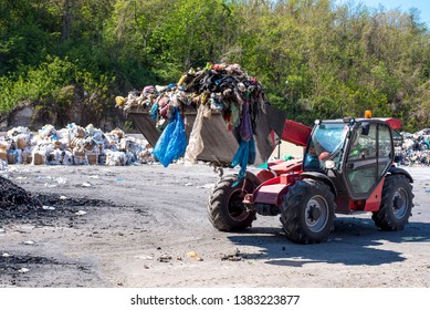 Wheel Loader Transporting Municipal Solid Waste In The Waste Treatment Plant