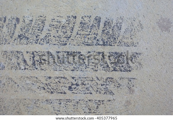 Wheel Mark on the\
concrete road:Close up,select focus with shallow depth of\
field:ideal use for\
background.