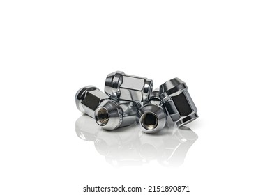 Wheel Nuts Isolated On White Background. Car Spare Part. Metal Nut Fastening The Car Wheel. Copy Space.