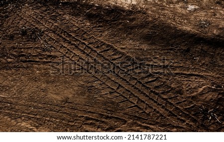 Wheel track on mud for background