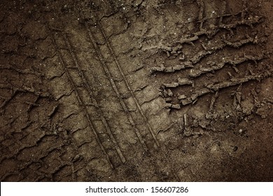 Wheel tracks on the soil. - Shutterstock ID 156607286