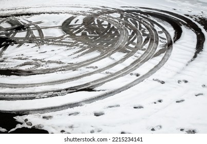 Wheel Tracks On The Winter Road Covered With Snow. Wet Melting Snow. Thaw.