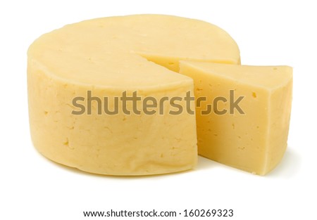 Wheel of traditional cheese isolated on white