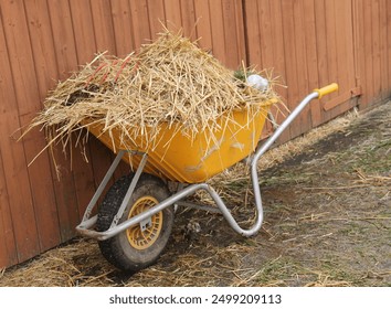 A Wheelbarrow Full from Mucking Out a Horse Stable. - Powered by Shutterstock