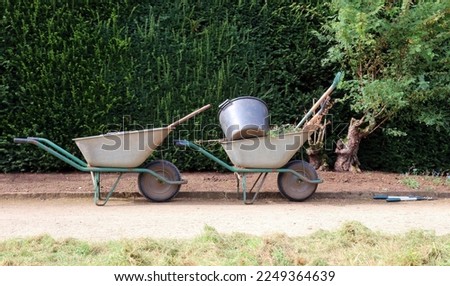 Wheelbarrows and garden tools, Derbyshire England
