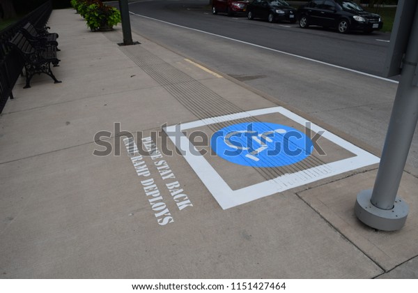 Wheelchair access point for\
bus stop.