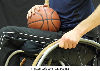  Wheelchair Basketball Player With Ball On His Lap