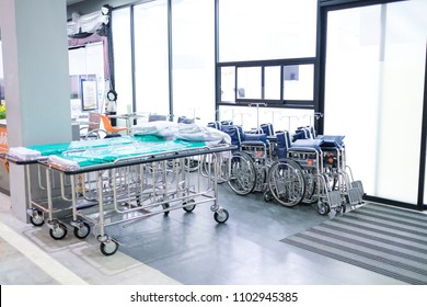 Wheelchair And Bed At Hospital.