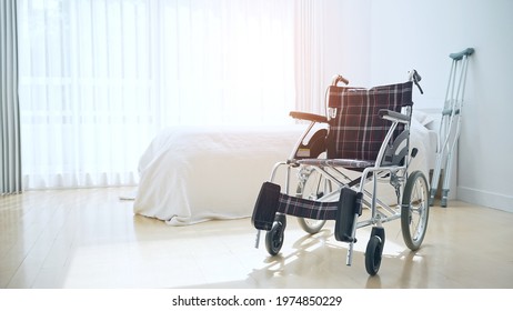 Wheelchair in the bedroom. Care and wellness concept. - Powered by Shutterstock