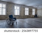 Wheelchair in a decrepit old mental institution