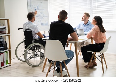 Wheelchair And Disability At Office. Giving Presentation At Work