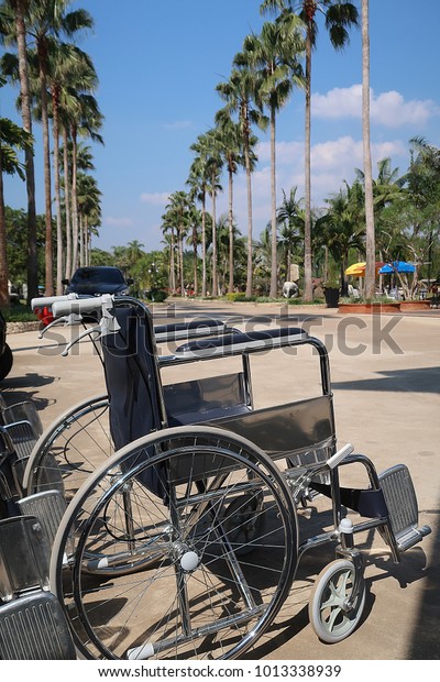 Wheelchair in the garden for those who want to\
help when visiting the\
garden.