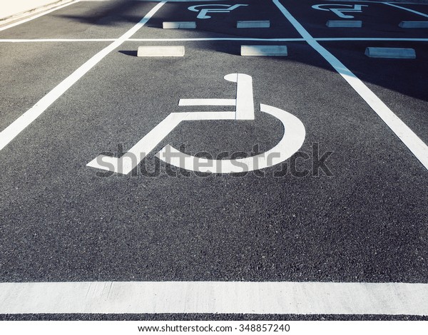 Wheelchair Handicap Sign at\
Parking lot