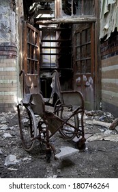 Wheelchair In Old Abandoned Hospital