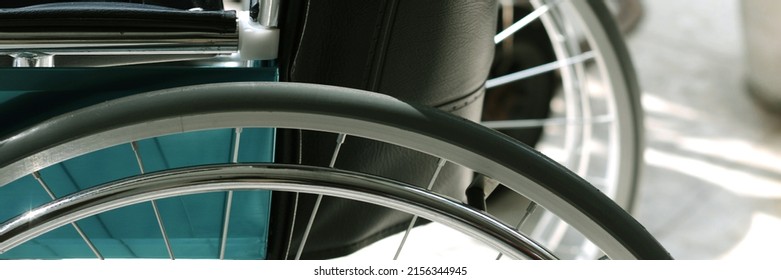 Wheelchair For Patients. Who Can't Walk Or A Sick Person Who Is Recovering Sit And Spin Straight, The Wheels Will Be Able To Move. Use In Hospital. Selective Focus