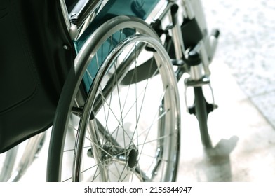 Wheelchair For Patients. Who Can't Walk Or A Sick Person Who Is Recovering Sit And Spin Straight, The Wheels Will Be Able To Move. Use In Hospital. Selective Focus