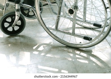 Wheelchair For Patients. Who Can't Walk Or A Sick Person Who Is Recovering Sit And Spin Straight, The Wheels Will Be Able To Move. Use In Hospital. Selective Focus