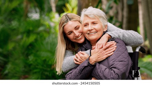 Wheelchair, senior and woman hug in park for retirement, rehabilitation and support. Person with disability, mother and daughter embrace in nature for healthcare, family care and mobility aid