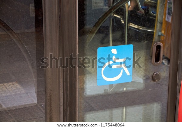 wheelchair sign on a public\
bus