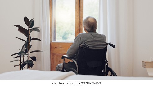 Wheelchair, thinking and senior man back in retirement home with mental health and grief. Bedroom, sad and elderly male person with disability at window with memory, lonely and dream in a house - Powered by Shutterstock