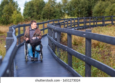 Wheelchair user on accessible path