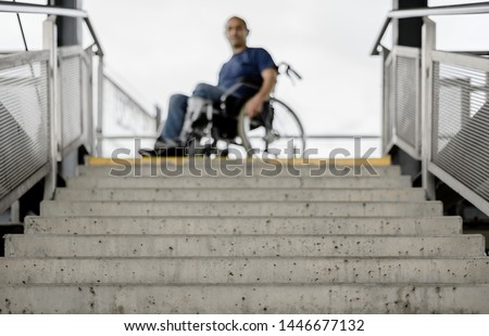 Wheelchair user at stairs concept accessible barrier free disability access