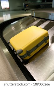Wheeled Suitcase On Baggage Carousel In Airport