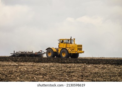 Wheeled Tractor Pulls The Disc Harrow