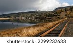 Wheeler, Oregon, USA - November 28, 2022:  Views of tracks on a rainy day along the Nehalem River.