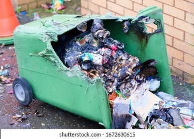 Wheelie Bin Vandalism On Side Burnt Out By Fire By Vandals In Council Estate London Arson Attack