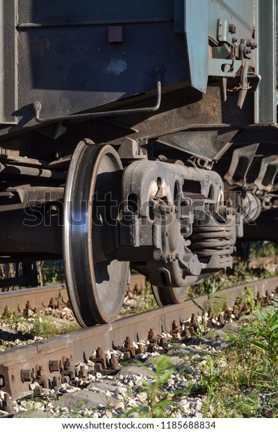 Wheels of a\
freight railway car close-up.\
Russia
