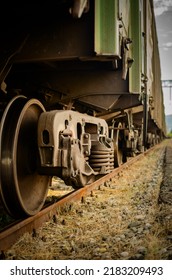 Wheels Of A Freight Train, A Closeup View Of Train Undercarriage