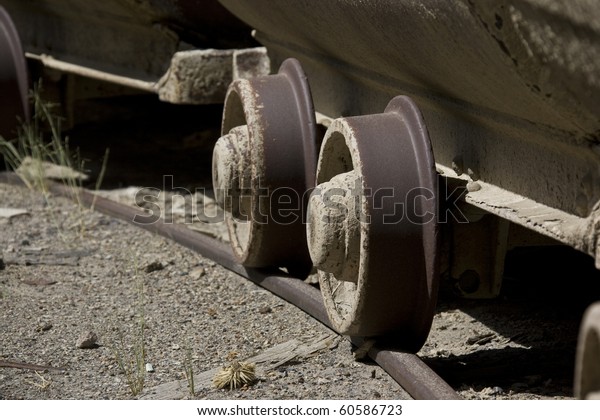 the wheels of old mine\
cart