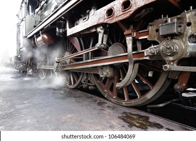 The Wheels Of An Old Steam Engine