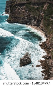 When the waves crash the rocks