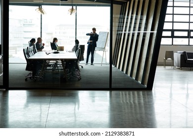 Where Important Decisions Are Made.... Shot Of A Group Of Executives Having A Meeting In A Boardroom.