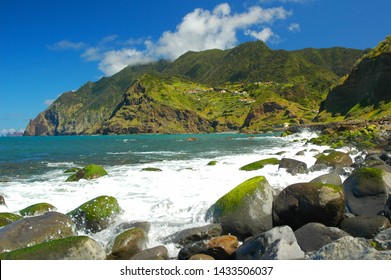 Where turquoise sea meets lush vegetation and mountains on the island of Madeira - Shutterstock ID 1433506037