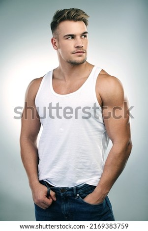 Wherever you go, never forget your goals. Studio shot of a handsome young man posing against a grey background.