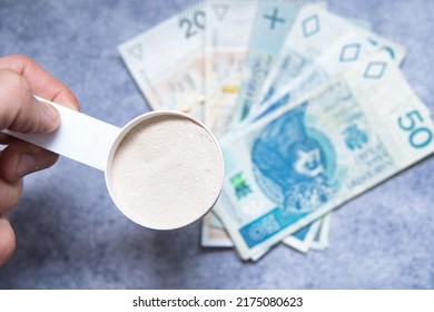 Whey Protein Concentrate Next To Money. Increase In The Prices Of Supplements Such As Creatine And Protein