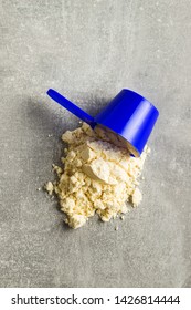 Whey Protein Powder In Scoop. Top View.