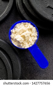 Whey Protein Powder In Scoop. Top View.