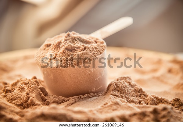 Whey protein scoop.
Sports nutrition.