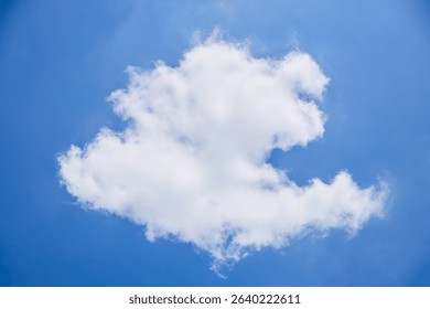 While Clouds free form shapes on blue sky background.
