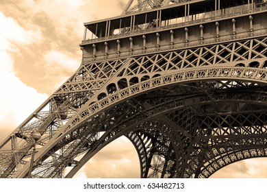 While French Elections Are Making Headlines, Eiffel Tower Remains Popular As Ever With Tourists, Paris France. Sepia Filter