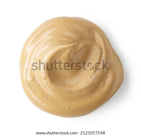 whipped caramel and coffee mousse cream isolated on white background, top view