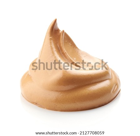 whipped caramel and coffee mousse cream isolated on white background