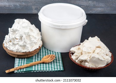 Whipped Cream with Butter. close up of a white whipped or sour cream in bowl. Vanilla whipped cream.